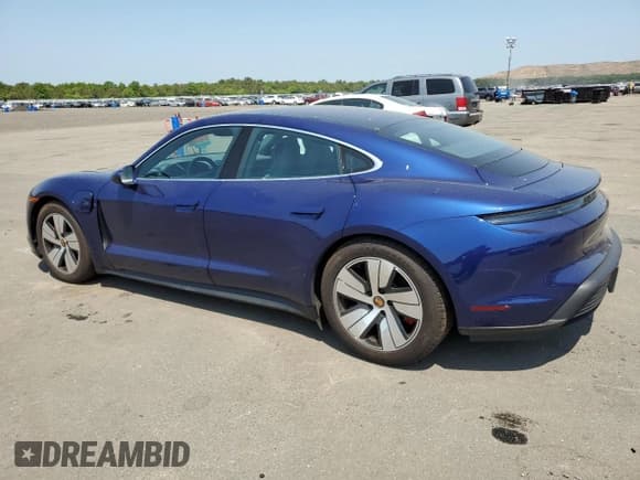 ✅ 2020 Porsche Taycan 4S • VIN: WP0AB2Y17LSA52275 • Лот: 54324343. Опубликован ранее на Copart с пробегом 28 520 миль. Бесплатный доступ к архиву аукционных продаж из США и подробный отчёт об истории автомобиля на DreamBid. Изображение 2.