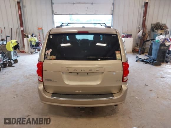 ✅ 2014 Dodge Grand Caravan SXT • VIN: 2C4RDGCG2ER105598 • Lot: 42648383. Listed on IAAI with 103,238 mi. Free auction sales archive from the USA and detailed vehicle history report at DreamBid. Image 16.