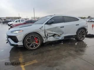 ✅ 2023 Lamborghini Urus Performante • VIN: ZPBUC3ZL1PLA27460 • Лот: 83781864. Опубликован ранее на Copart с пробегом 9 091 миль. Бесплатный доступ к архиву аукционных продаж из США и подробный отчёт об истории автомобиля на DreamBid. Изображение 1.