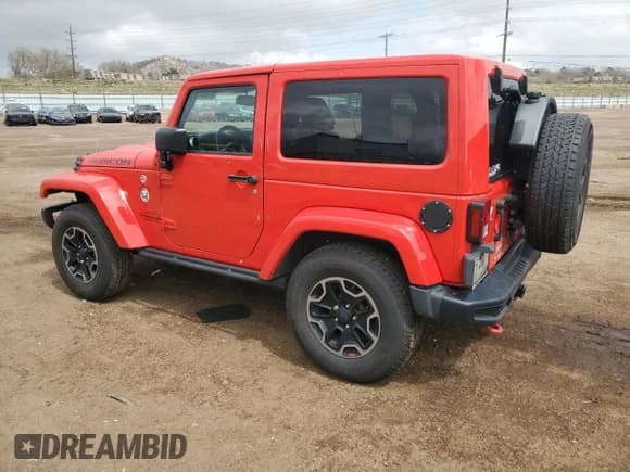 ✅ 2016 Jeep Wrangler Rubicon • VIN: 1C4BJWCG0GL303158 • Lot: 51959055. Listed on Copart with 79,654 mi. Free auction sales archive from the USA and detailed vehicle history report at DreamBid. Image 2.