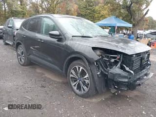 ✅ 2022 Ford Escape SEL • VIN: 1FMCU9H94NUC00660 • Lot: 43563987. Listed on IAAI with 10,822 mi. Free auction sales archive from the USA and detailed vehicle history report at DreamBid. Image 1.