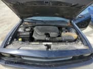 ✅ 2012 Dodge Challenger SXT • VIN: 2C3CDYAG1CH131048 • Lot: 77960354. Wystawiony na Copart z przebiegiem Nie podano. Bezpłatny archiwum sprzedaży aukcyjnych z USA i szczegółowy raport historii pojazdu na DreamBid. Zdjęcie 11.