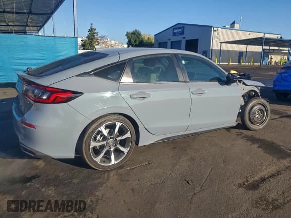 ✅ 2025 Honda Civic Sport Touring • VIN: JHMFL4H9XSX007767 • Лот: 94085265. Опубликован ранее на Copart с пробегом 747 миль. Бесплатный доступ к архиву аукционных продаж из США и подробный отчёт об истории автомобиля на DreamBid. Изображение 3.