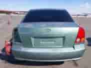 2005 Hyundai Accent GLS z VIN KMHCG45C95U620716, wystawiony jako IAAI lot #41740573 z przebiegiem 187 971 mil mil oraz . Historia ofert i sprzedaży dostępna na DreamBid. Obrazek 17.