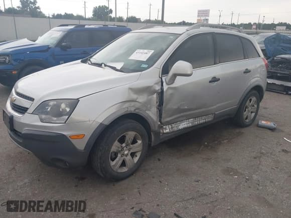 ✅ 2015 Chevrolet Captiva Sport LS • VIN: 3GNAL2EK8FS519825 • Лот: 43102487. Опубликован ранее на IAAI с пробегом 156 499 миль. Бесплатный доступ к архиву аукционных продаж из США и подробный отчёт об истории автомобиля на DreamBid. Изображение 2.