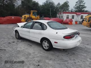 ✅ 1999 Ford Taurus SE • VIN: 1FAFP53S4XA185115 • Lot: 41263216. Listed on IAAI with 182,770 mi. Free auction sales archive from the USA and detailed vehicle history report at DreamBid. Image 3.