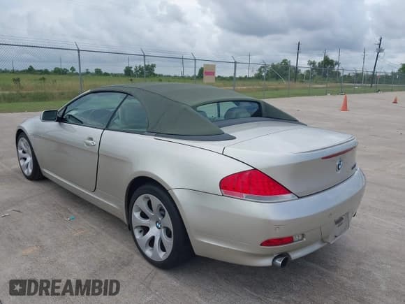 ✅ 2005 BMW 6 Series 645Ci • VIN: WBAEK734X5B325092 • Лот: 42878256. Опубликован ранее на IAAI с пробегом 102 679 миль. Бесплатный доступ к архиву аукционных продаж из США и подробный отчёт об истории автомобиля на DreamBid. Изображение 3.