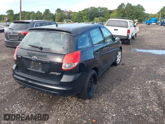 ✅ 2003 Toyota Matrix Std • VIN: 2T1KR32E03C100487 • Lot: 43173665. Listed on IAAI with 200,399 mi. Free auction sales archive from the USA and detailed vehicle history report at DreamBid. Image 4.