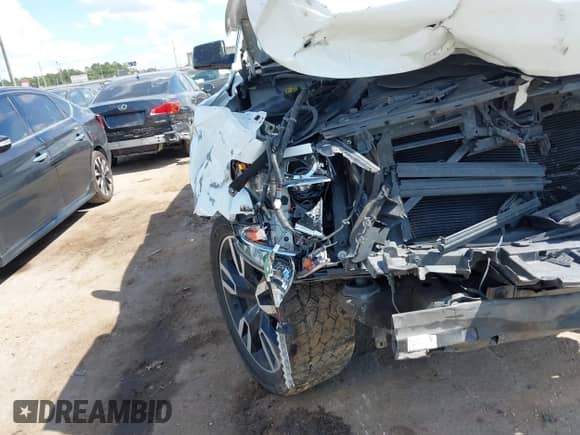 2020 Chevrolet Tahoe Premier with VIN 1GNSKCKJ8LR134496, listed as a IAAI auction lot 43360495 with 118,770 mi miles and . Bid and sale history available at DreamBid. Image 6.