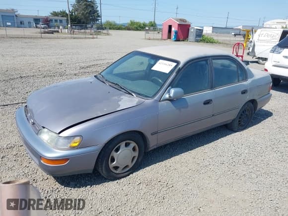 ✅ 1997 Toyota Corolla DX • VIN: 1NXBB02E7VZ658342 • Lot: 42116289. Wystawiony na IAAI z przebiegiem 230 321 mil. Bezpłatny archiwum sprzedaży aukcyjnych z USA i szczegółowy raport historii pojazdu na DreamBid. Zdjęcie 2.