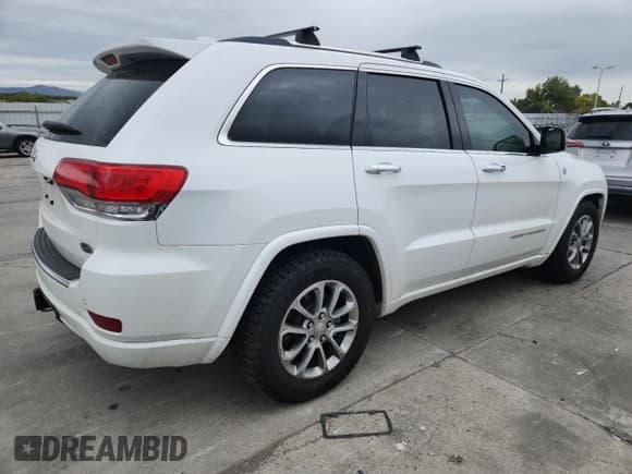 ✅ 2015 Jeep Grand Cherokee Overland • VIN: 1C4RJFCM9FC866700 • Lot: 86303435. Listed on Copart with 86,831 mi. Free auction sales archive from the USA and detailed vehicle history report at DreamBid. Image 3.