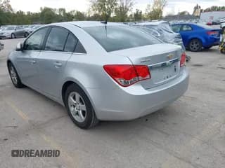 ✅ 2013 Chevrolet Cruze 1LT • VIN: 1G1PC5SB4D7324639 • Lot: 43594420. Listed on IAAI with 143,044 mi. Free auction sales archive from the USA and detailed vehicle history report at DreamBid. Image 3.