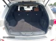 ✅ 2015 Jeep Grand Cherokee Summit • VIN: 1C4RJEJG5FC105296 • Lot: 43231201. Listed on IAAI with 124,311 mi. Free auction sales archive from the USA and detailed vehicle history report at DreamBid. Image 18.