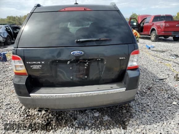 ✅ 2009 Ford Taurus X SEL • VIN: 1FMDK02W29GA03382 • Лот: 92851615. Опубликован ранее на Copart с пробегом 254 549 миль. Бесплатный доступ к архиву аукционных продаж из США и подробный отчёт об истории автомобиля на DreamBid. Изображение 6.