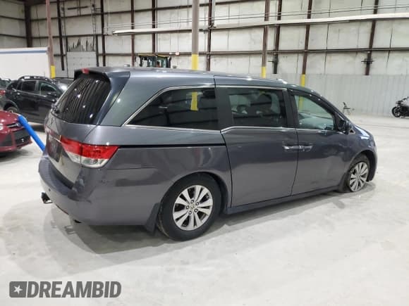✅ 2014 Honda Odyssey EX-L • VIN: 5FNRL5H64EB041390 • Lot: 92021555. Listed on Copart with 201,147 mi. Free auction sales archive from the USA and detailed vehicle history report at DreamBid. Image 3.