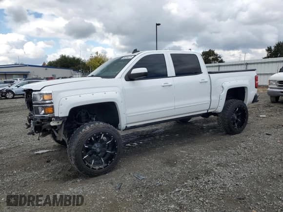 ✅ 2015 Chevrolet Silverado 1500 LT • VIN: 3GCUKREC7FG204740 • Lot: 86334975. Listed on Copart with 48,473 mi. Free auction sales archive from the USA and detailed vehicle history report at DreamBid. Image 1.
