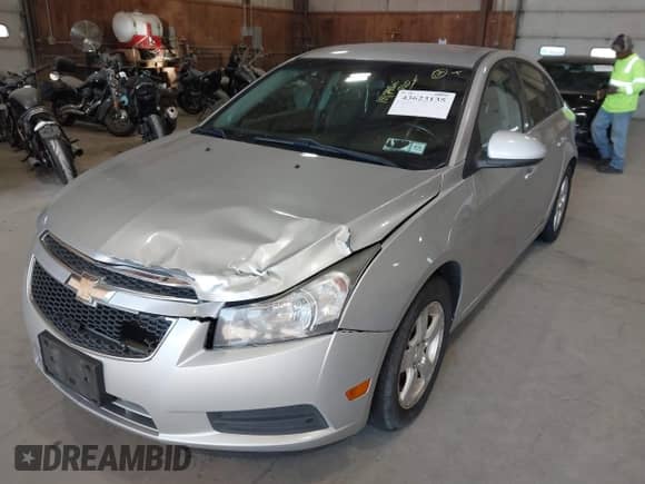 2011 Chevrolet Cruze 1LT z VIN 1G1PF5S90B7253280, wystawiony jako IAAI lot #43623135 z przebiegiem 181 798 mil mil oraz . Historia ofert i sprzedaży dostępna na DreamBid. Obrazek 6.