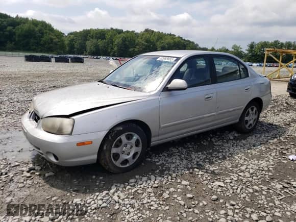 2003 Hyundai Elantra GLS with VIN KMHDN45D73U625235, listed as a Copart auction lot 62965683 with 153,845 mi miles and Salvage title. Bid and sale history available at DreamBid. Image 1.