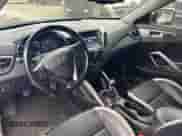 2015 Hyundai Veloster Turbo z VIN KMHTC6AE3FU228606, wystawiony jako Copart lot #48008524 z przebiegiem 103 559 mil mil oraz . Historia ofert i sprzedaży dostępna na DreamBid. Obrazek 9.