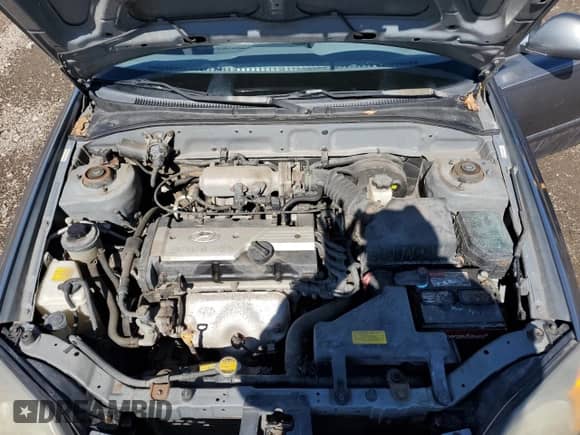 2005 Hyundai Accent GLS с VIN KMHCG35C65U331867, выставлен на аукционе Copart как лот 49637495 с пробегом 63 901 миль миль и Чистый • Clean title. История ставок и продаж доступна на DreamBid. Изображение 11.