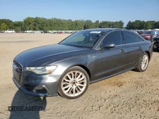 ✅ 2014 Audi A6 Prestige • VIN: WAUHMAFC6EN096996 • Лот: 80818235. Опубликован ранее на Copart с пробегом 142 718 миль. Бесплатный доступ к архиву аукционных продаж из США и подробный отчёт об истории автомобиля на DreamBid. Изображение 1.