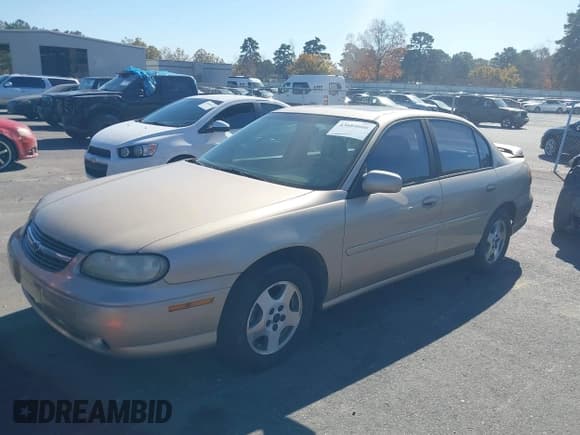 ✅ 2003 Chevrolet Malibu LS • VIN: 1G1NE52J33M615058 • Lot: 43684608. Listed on IAAI with 138,574 mi. Free auction sales archive from the USA and detailed vehicle history report at DreamBid. Image 2.