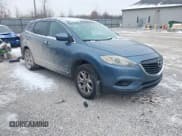 ✅ 2015 Mazda CX-9 Sport • VIN: JM3TB3BA1F0452943 • Lot: 43871277. Wystawiony na IAAI z przebiegiem 135 830 mil. Bezpłatny archiwum sprzedaży aukcyjnych z USA i szczegółowy raport historii pojazdu na DreamBid. Zdjęcie 1.