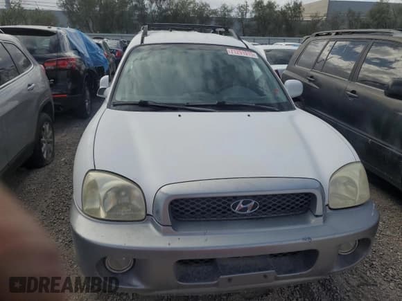 ✅ 2002 Hyundai Santa Fe GLS • VIN: KM8SC73D92U175975 • Лот: 71291915. Опубликован ранее на Copart с пробегом 124 648 миль. Бесплатный доступ к архиву аукционных продаж из США и подробный отчёт об истории автомобиля на DreamBid. Изображение 5.