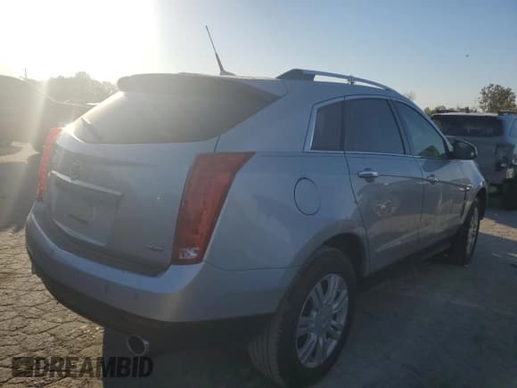 ✅ 2012 Cadillac SRX Luxury Collection • VIN: 3GYFNAE38CS545634 • Lot: 74961344. Wystawiony na Copart z przebiegiem 97 223 mil. Bezpłatny archiwum sprzedaży aukcyjnych z USA i szczegółowy raport historii pojazdu na DreamBid. Zdjęcie 3.