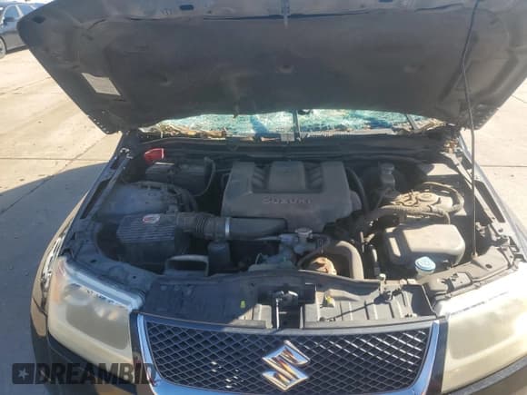 ✅ 2007 Suzuki Grand Vitara • VIN: JS3TE941X74202046 • Lot: 80221394. Listed on Copart with 153,791 mi. Free auction sales archive from the USA and detailed vehicle history report at DreamBid. Image 12.