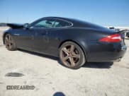 ✅ 2015 Jaguar XK XKR • VIN: SAJWA4DCXFMB55227 • Lot: 48455465. Listed on Copart with 64,050 mi. Free auction sales archive from the USA and detailed vehicle history report at DreamBid. Image 2.