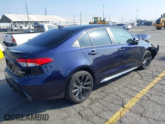 ✅ 2023 Toyota Corolla Hybrid LE • VIN: JTDBCMFEXPJ005589 • Lot: 43373527. Listed on IAAI with 79,564 mi. Free auction sales archive from the USA and detailed vehicle history report at DreamBid. Image 4.