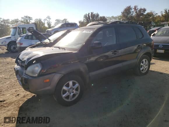 2005 Hyundai Tucson GLS z VIN KM8JN12D45U065618, wystawiony jako Copart lot #77370754 z przebiegiem 87 525 mil mil oraz Szkoda całkowita • Salvage title. Historia ofert i sprzedaży dostępna na DreamBid. Obrazek 1.