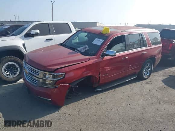 2015 Chevrolet Tahoe LTZ z VIN 1GNSCCKC4FR510792, wystawiony jako IAAI lot #43359343 z przebiegiem 215 235 mil mil oraz . Historia ofert i sprzedaży dostępna na DreamBid. Obrazek 2.