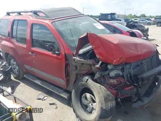 ✅ 2012 Nissan Xterra X • VIN: 5N1AN0NU2CC524234 • Lot: 42554360. Listed on IAAI with 207,481 mi. Free auction sales archive from the USA and detailed vehicle history report at DreamBid. Image 1.