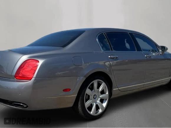 ✅ 2006 Bentley Flying Spur • VIN: SCBBR53W36C033886 • Лот: 89439285. Опубликован ранее на Copart с пробегом 91 632 миль. Бесплатный доступ к архиву аукционных продаж из США и подробный отчёт об истории автомобиля на DreamBid. Изображение 4.