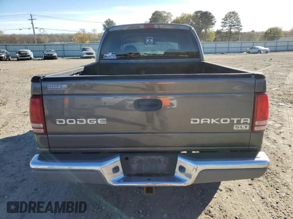 ✅ 2004 Dodge Dakota SLT • VIN: 1D7HL48NX4S579127 • Lot: 83688784. Wystawiony na Copart z przebiegiem 261 990 mil. Bezpłatny archiwum sprzedaży aukcyjnych z USA i szczegółowy raport historii pojazdu na DreamBid. Zdjęcie 6.