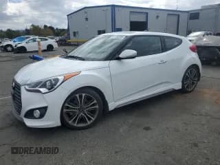 ✅ 2016 Hyundai Veloster Turbo Rally Edition • VIN: KMHTC6AE5GU300181 • Lot: 86185295. Wystawiony na Copart z przebiegiem 150 440 mil. Bezpłatny archiwum sprzedaży aukcyjnych z USA i szczegółowy raport historii pojazdu na DreamBid. Zdjęcie 1.