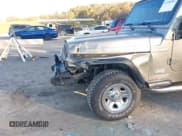 ✅ 2003 Jeep Wrangler Sport • VIN: 1J4FA49S13P326446 • Lot: 43596962. Wystawiony na IAAI z przebiegiem 98 980 mil. Bezpłatny archiwum sprzedaży aukcyjnych z USA i szczegółowy raport historii pojazdu na DreamBid. Zdjęcie 6.