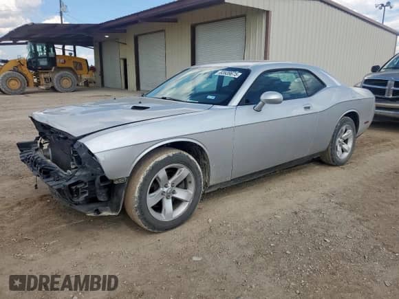 2010 Dodge Challenger SE с VIN 2B3CJ4DV2AH323214, выставлен на аукционе Copart как лот 83939675 с пробегом 178 492 миль миль и Списание • Salvage title. История ставок и продаж доступна на DreamBid. Изображение 1.