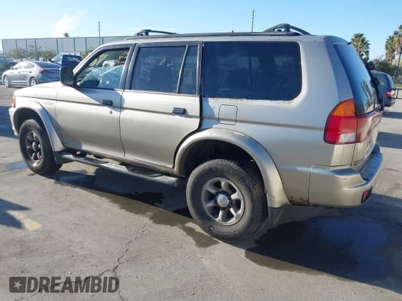 ✅ 1999 Mitsubishi Montero Sport XLS • VIN: JA4LS31H3XP034040 • Lot: 41533558. Wystawiony na IAAI z przebiegiem 265 800 mil. Bezpłatny archiwum sprzedaży aukcyjnych z USA i szczegółowy raport historii pojazdu na DreamBid. Zdjęcie 3.