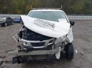 ✅ 2017 Nissan NV200 SV • VIN: 3N6CM0KN4HK711597 • Lot: 43562377. Listed on IAAI with 122,857 mi. Free auction sales archive from the USA and detailed vehicle history report at DreamBid. Image 13.