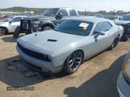 ✅ 2022 Dodge Challenger SXT • VIN: 2C3CDZAG8NH137597 • Lot: 43182589. Listed on IAAI with 39,666 mi. Free auction sales archive from the USA and detailed vehicle history report at DreamBid. Image 2.