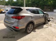 ✅ 2018 Hyundai Santa Fe 2.4L • VIN: 5XYZT3LB8JG546490 • Лот: 58810893. Опубликован ранее на Copart с пробегом 76 883 миль. Бесплатный доступ к архиву аукционных продаж из США и подробный отчёт об истории автомобиля на DreamBid. Изображение 3.