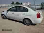 2010 Hyundai Accent GLS z VIN KMHCN4AC2AU480451, wystawiony jako Copart lot #69716034 z przebiegiem 162 717 mil mil oraz Szkoda całkowita • Salvage title. Historia ofert i sprzedaży dostępna na DreamBid. Obrazek 2.