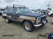✅ 1987 Jeep Grand Wagoneer • VIN: 1JCNJ15UXHT043452 • Lot: 86832505. Wystawiony na Copart z przebiegiem 159 429 mil. Bezpłatny archiwum sprzedaży aukcyjnych z USA i szczegółowy raport historii pojazdu na DreamBid. Zdjęcie 4.