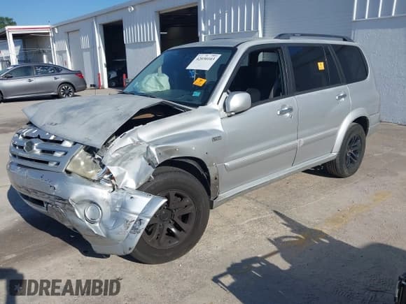✅ 2004 Suzuki XL7 LX • VIN: JS3TY92V744109459 • Lot: 42030103. Listed on IAAI with 170,132 mi. Free auction sales archive from the USA and detailed vehicle history report at DreamBid. Image 2.