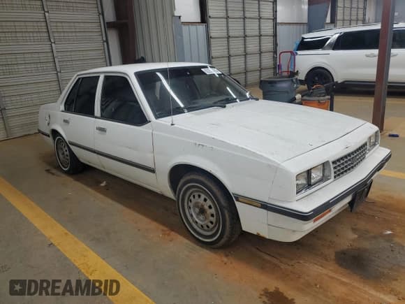 ✅ 1987 Chevrolet Cavalier • VIN: 1G1JC511XH7154372 • Lot: 62254405. Listed on Copart with 433,621 mi. Free auction sales archive from the USA and detailed vehicle history report at DreamBid. Image 4.