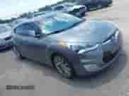 2012 Hyundai Veloster w/Black Int with VIN KMHTC6ADXCU061325, listed as a IAAI auction lot 42556398 with 122,954 mi miles and . Bid and sale history available at DreamBid. Image 1.