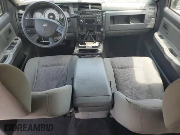 2008 Dodge Dakota SLT с VIN 1D7HE48K68S501871, выставлен на аукционе Copart как лот 54688015 с пробегом 152 712 миль миль и Списание • Salvage title. История ставок и продаж доступна на DreamBid. Изображение 8.